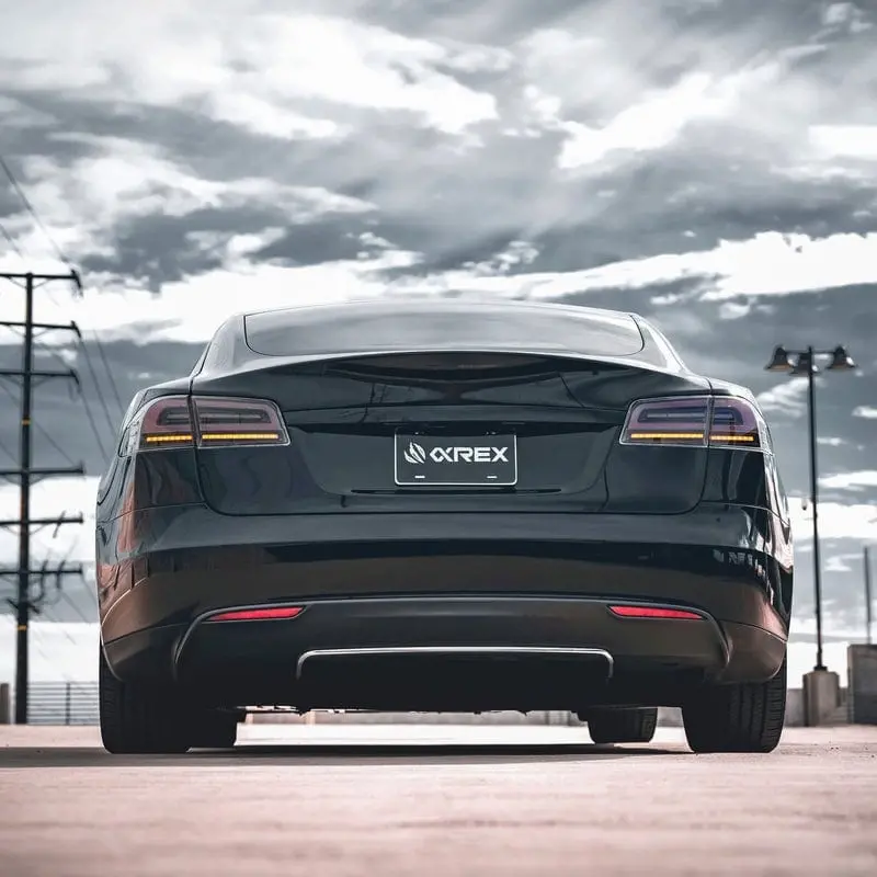 Alpharex Luxx-Series Black Smoke Led Tail Lights (With Black Trunk Center Piece Replacement) For Tesla Model S 2012-2021 1